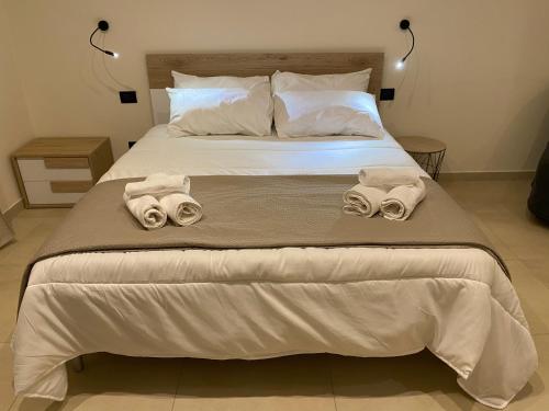 Postel nebo postele na pokoji v ubytování Casa Glametto