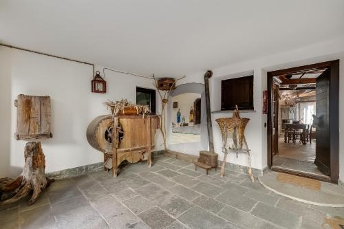 a room filled with lots of antiques on display at Grange Romantic Retreat Mountain View - Happy Rentals in Grange Sises