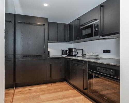 Dapur atau dapur kecil di AlpenParks Hotel & Apartment Taxacher