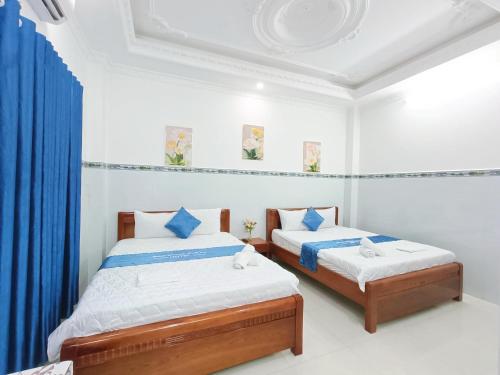 Voodi või voodid majutusasutuse Phuong Thuy Hotel toas