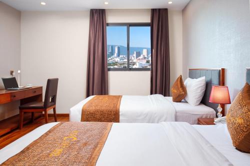 Postel nebo postele na pokoji v ubytování Mercury Apartment Danang