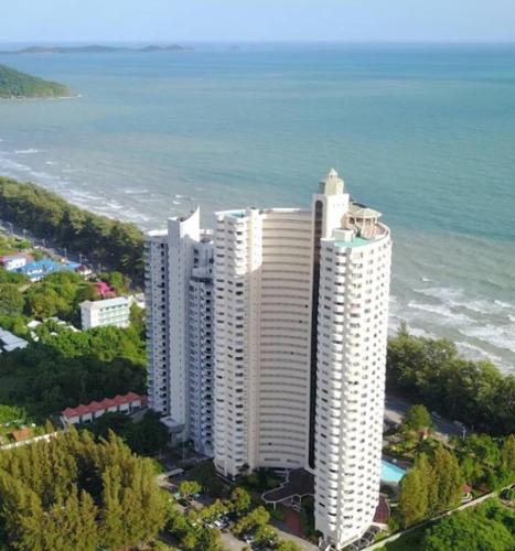 an aerial view of a tall building near the ocean at Apartment with wonderful view, Mae Ramphueng Beach, Rayong in Rayong