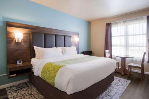 Cama o camas de una habitación en Inn at Port Gardner-Everett Waterfront, Ascend Hotel Collection