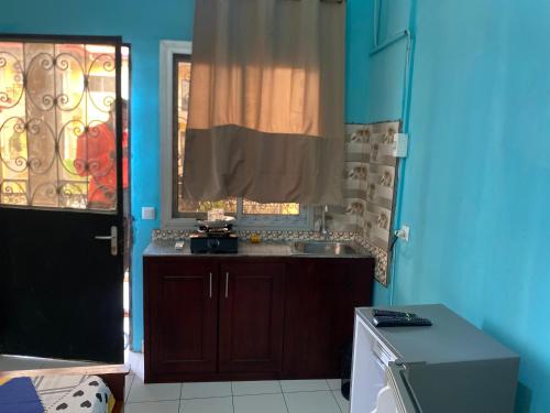 Η κουζίνα ή μικρή κουζίνα στο Résidence ALMA