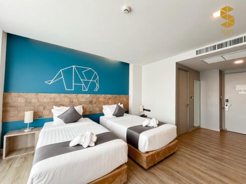 Una cama o camas en una habitación de Slive Hotel