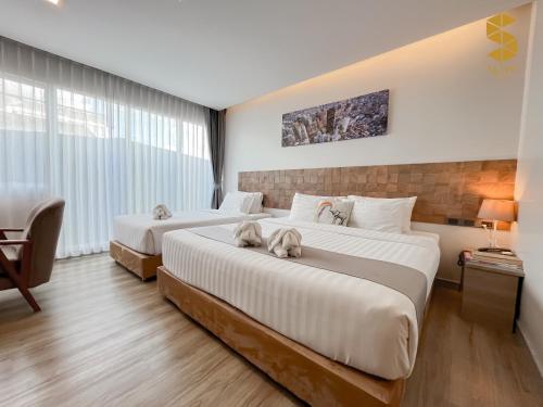 Una cama o camas en una habitación de Slive Hotel