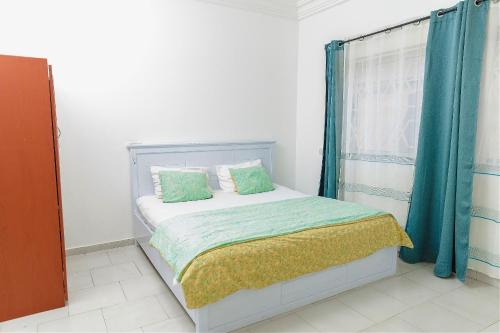 VIST Apartments Ghanaにあるベッド