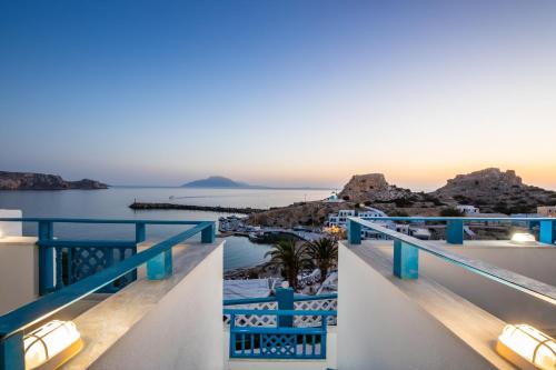 a view of the ocean from the balcony of a villa at Arhontiko Hotel in Foinikion