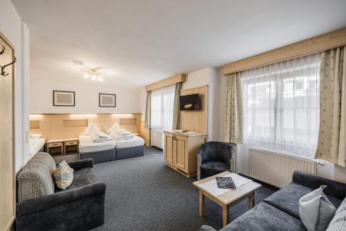 Ein Bett oder Betten in einem Zimmer der Unterkunft Andre Arnold - Boutique Pension
