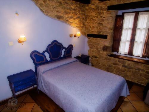 Postel nebo postele na pokoji v ubytování Posada Corral Mayor
