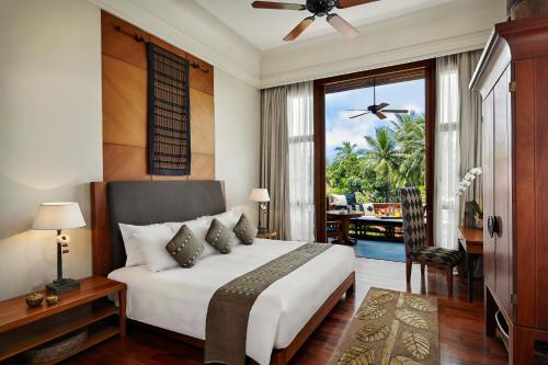 Postel nebo postele na pokoji v ubytování Anantara Hua Hin Resort
