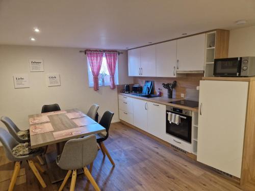 Kuchyň nebo kuchyňský kout v ubytování Ferienwohnung Sonnenschein