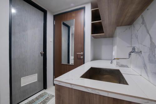 Koupelna v ubytování Apartemen Riverdale Cikarang By Abdihome