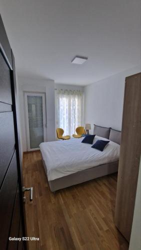 En eller flere senge i et værelse på Apartment Katarina
