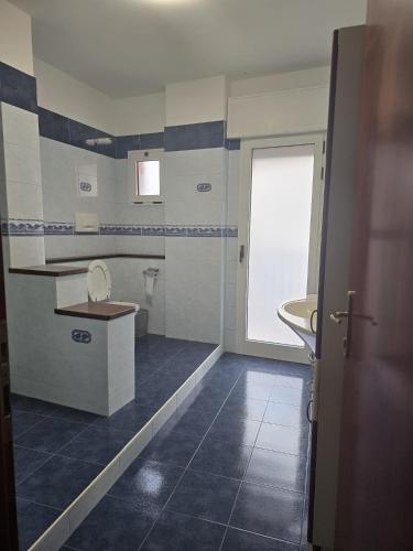 a bathroom with a toilet and a sink at MMM HOME Train Station 4 in Mestre