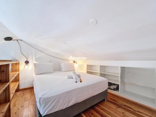 Katil atau katil-katil dalam bilik di Bois de Mer 3 étoiles - T2 45m2 à deux minutes de la plage - Saint-Leu