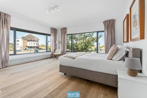 Ένα ή περισσότερα κρεβάτια σε δωμάτιο στο Villa Sealise - spacious house by the dunes in Westende