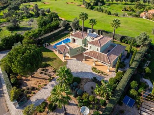 an aerial view of a house with a swimming pool at Villa Bliss by Algarve Vacation in Praia do Carvoeiro