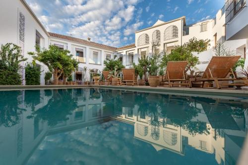 Bazén v ubytování P SANTA CLARA HOTEL BOUTIQUE By Sojo nebo v jeho okolí