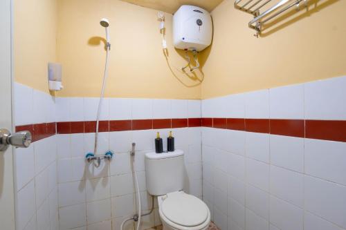Koupelna v ubytování Apartemen Mutiara Bekasi By Abdihome