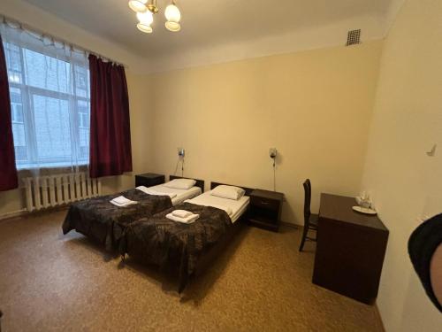 Postel nebo postele na pokoji v ubytování Hostel Viktorija with Private Rooms