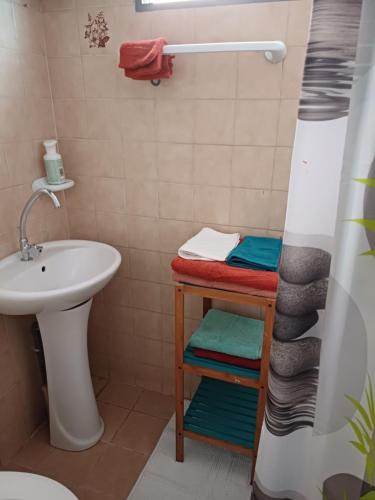 a bathroom with a sink and a shower at Charmant appart in Fort-de-France
