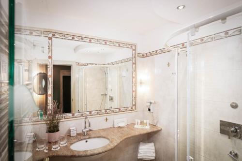 Koupelna v ubytování Hotel Villa Rainer