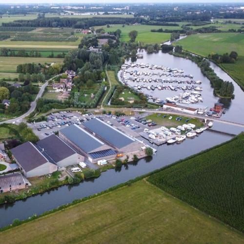 an aerial view of a marina with a bunch of boats at Trek-in in IJsselstein