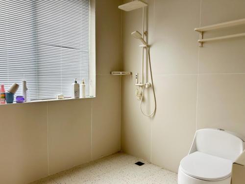Ένα μπάνιο στο Jingdezhen Shower&bed Youth Hostel