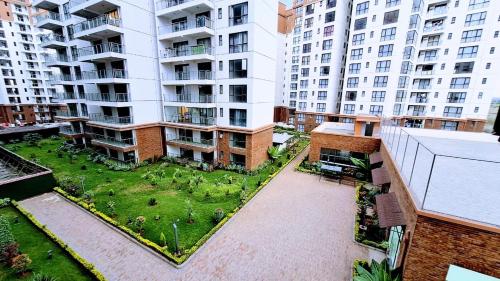 an aerial view of an apartment complex with a courtyard at Apple Tree Apartment , 2 bedroom Luxury suites in Syokimau