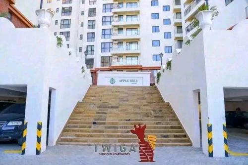 a painting of a deer standing in front of some stairs at Apple Tree Apartment , 2 bedroom Luxury suites in Syokimau