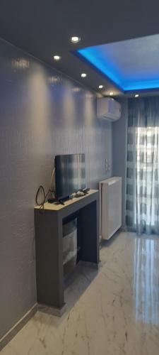 an office with a desk with a computer on it at MONASTHRIOY PALLAS 3 By MAKHOME in Thessaloniki