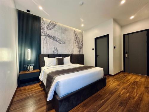LION 12 Hotelにあるベッド