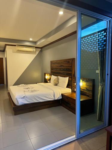 Postel nebo postele na pokoji v ubytování Pratum Resort