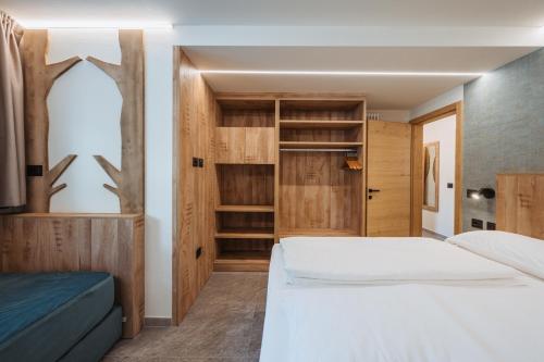 Postel nebo postele na pokoji v ubytování Residence Piz Aot