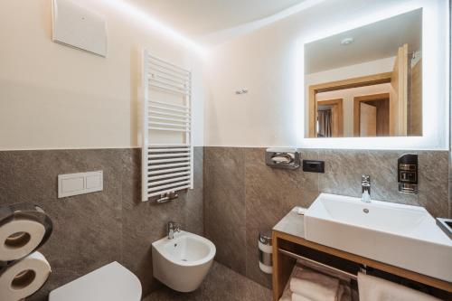 Koupelna v ubytování Residence Piz Aot