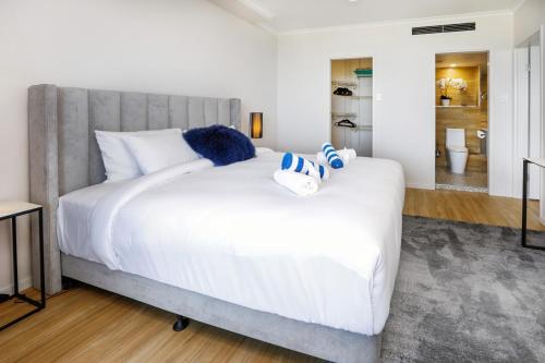 Cama o camas de una habitación en The Condo at Northshore Tower