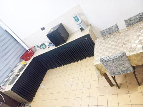 TV a/nebo společenská místnost v ubytování AYUHOMESTAY ii, KUNDANG GAMUDA GARDEN