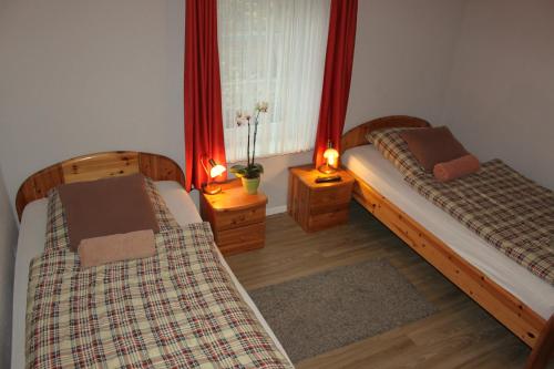 
Ein Bett oder Betten in einem Zimmer der Unterkunft Zum Landkrog
