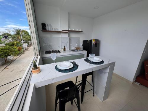 Kuchyň nebo kuchyňský kout v ubytování ApartaEstudio NUEVO para Estrenar Primera Ensenada Wifi 100Mbps