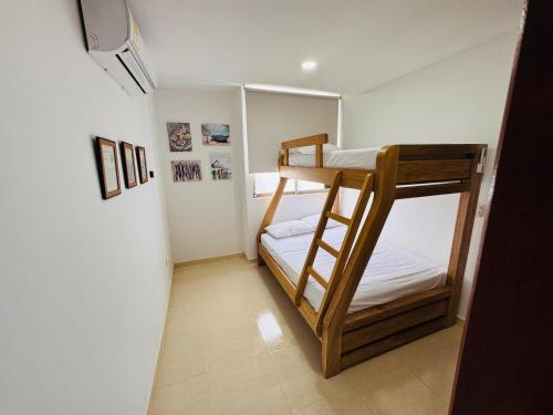 Postel nebo postele na pokoji v ubytování ApartaEstudio NUEVO para Estrenar