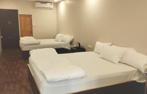 Marron sea view resoortにあるベッド