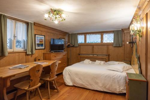 Ένα ή περισσότερα κρεβάτια σε δωμάτιο στο FALORIA Studio Apartment