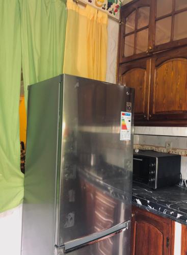 Una cocina o zona de cocina en Charming quiet appartement, very good location