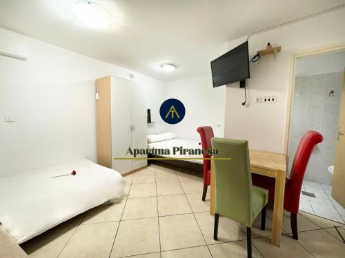 TV a/nebo společenská místnost v ubytování Apartma PIRANESA II