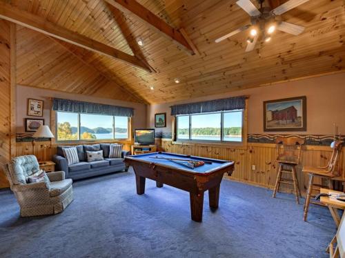 a living room with a pool table in it at BEST VIEWS LAKE FRONT Waters Edge in Dandridge