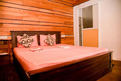 Postel nebo postele na pokoji v ubytování Anju Beach