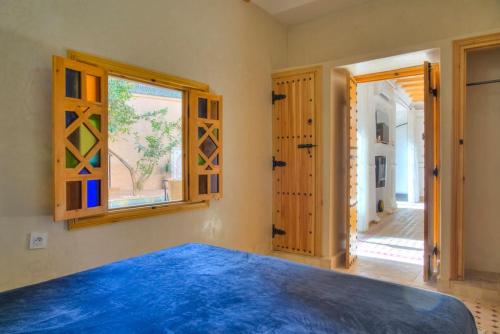 Postel nebo postele na pokoji v ubytování Luxe RIAD-privé-RIAD MIMI centre-ville