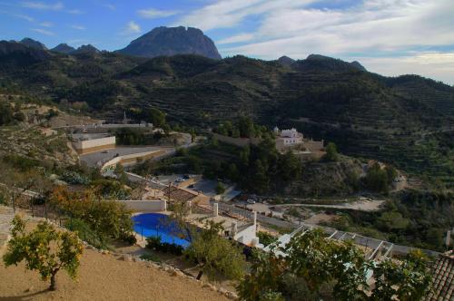 an aerial view of a village in the mountains at Alojamientos Turisticos Isa i Toni in Sella
