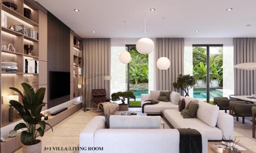 a living room with white couches and a tv at Bali Investment Agency in Ubud